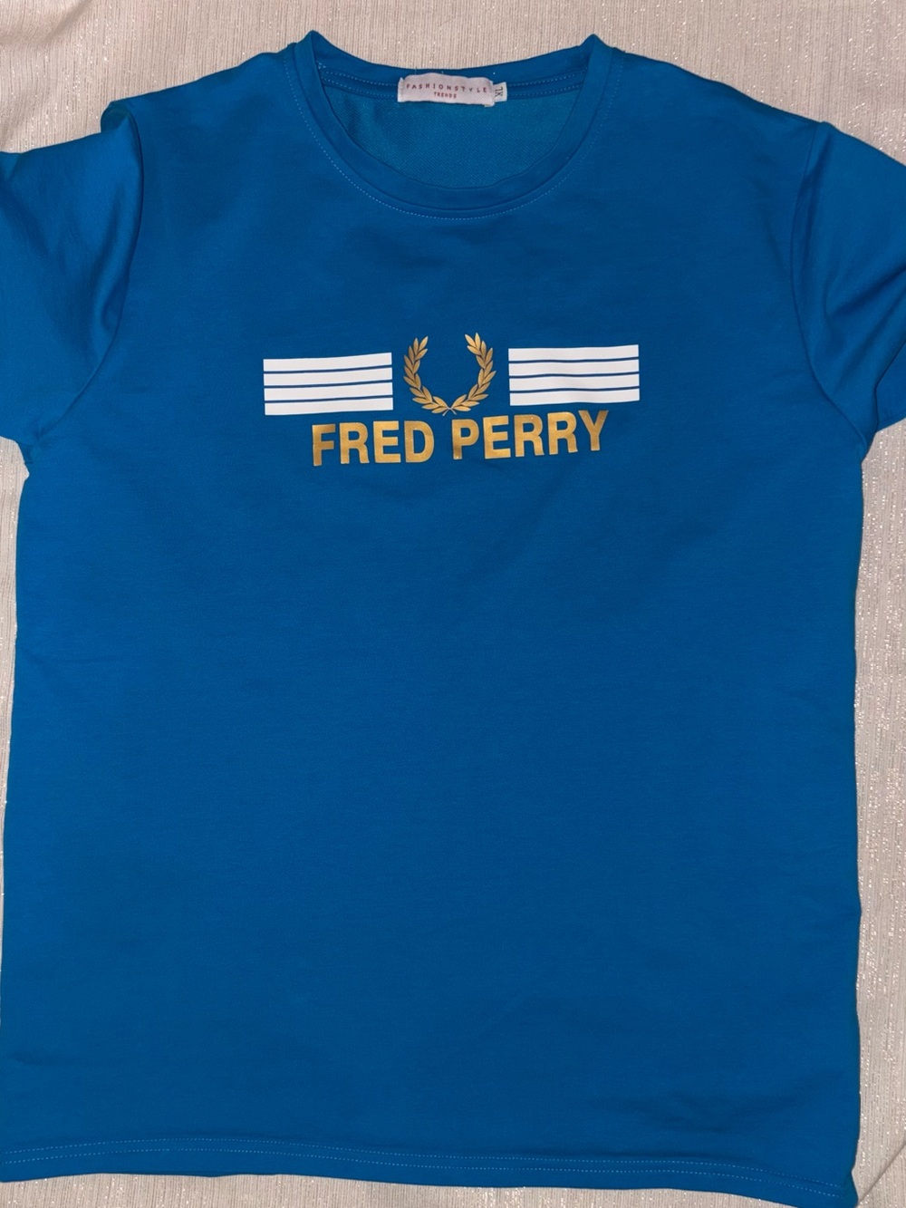 Fred Perry Blue Crewneck Tee with Gold Logo and White Stripes